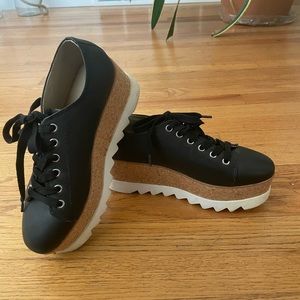 Black leather platforms by Steve Madden.